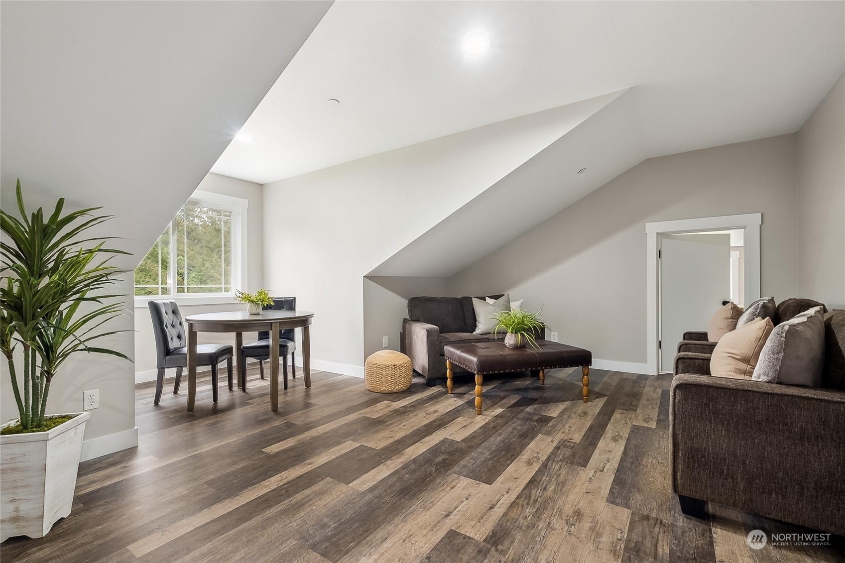 24827 247th Place Southeast Maple Valley, WA 98038 - Photo 23 of 33 a living room with furniture and wooden floor