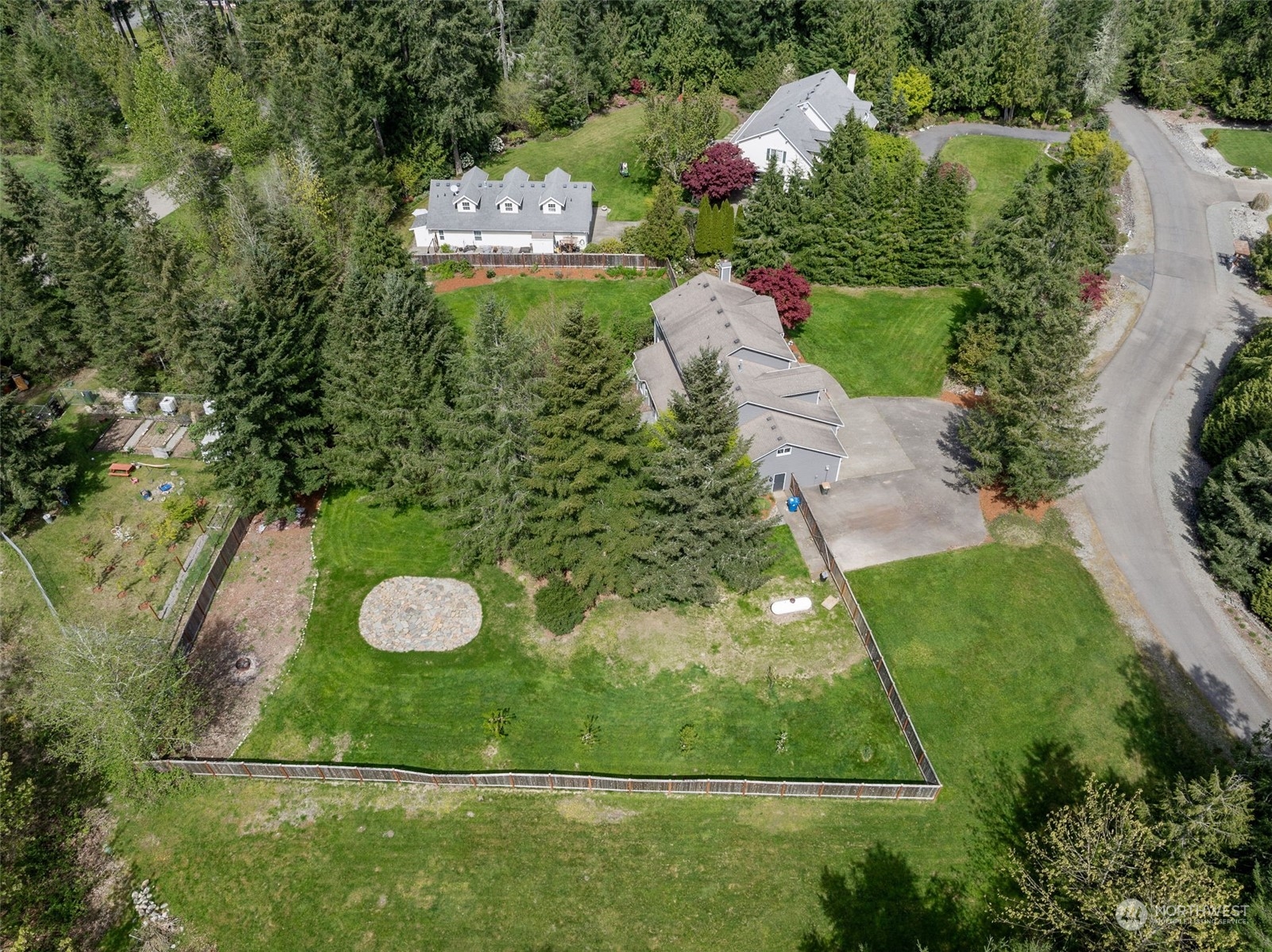 24827 247th Place Southeast Maple Valley, WA 98038 - Photo 30 of 33 a view of a back yard of the house
