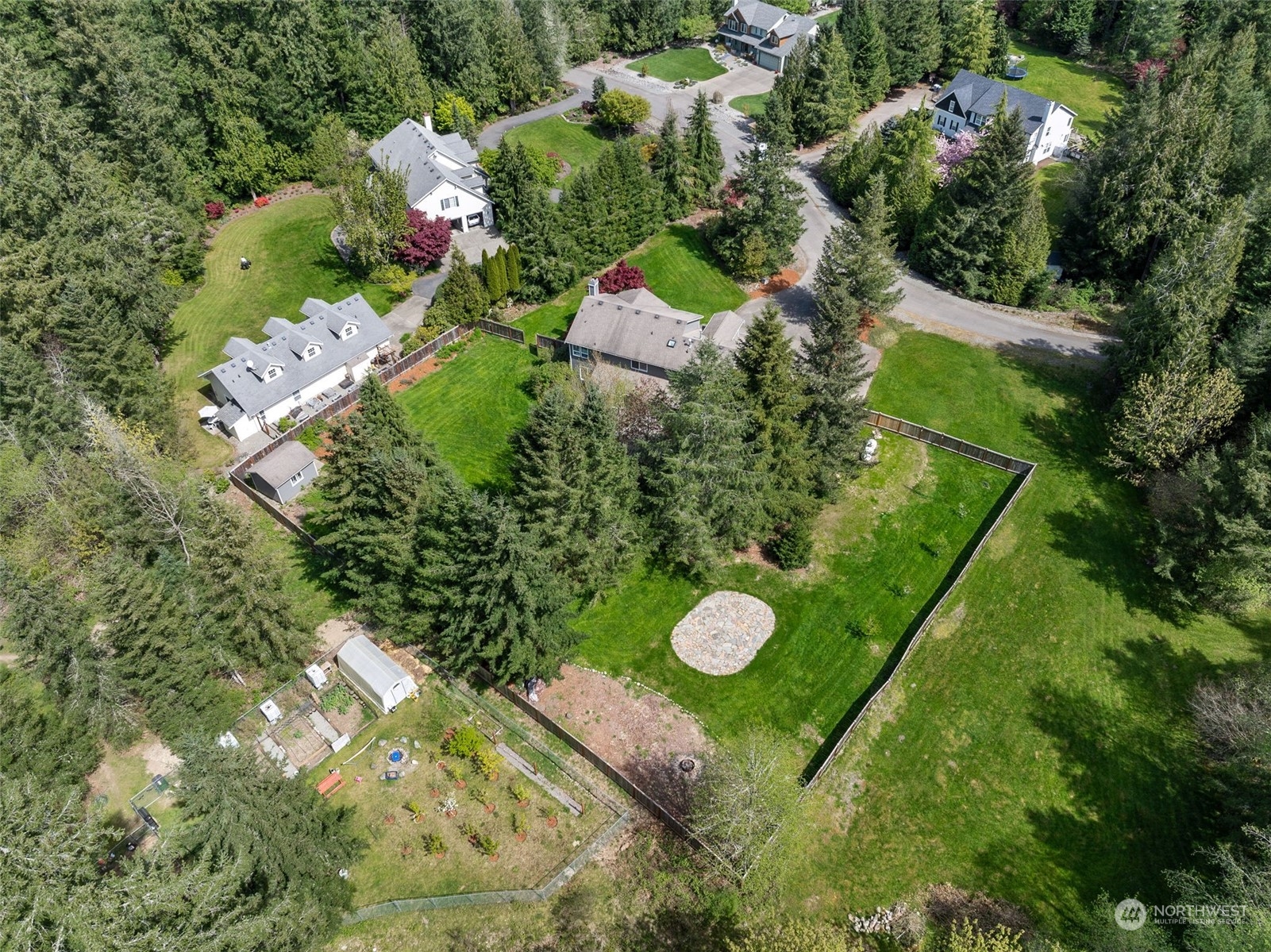 24827 247th Place Southeast Maple Valley, WA 98038 - Photo 31 of 33 an aerial view of a house with a yard