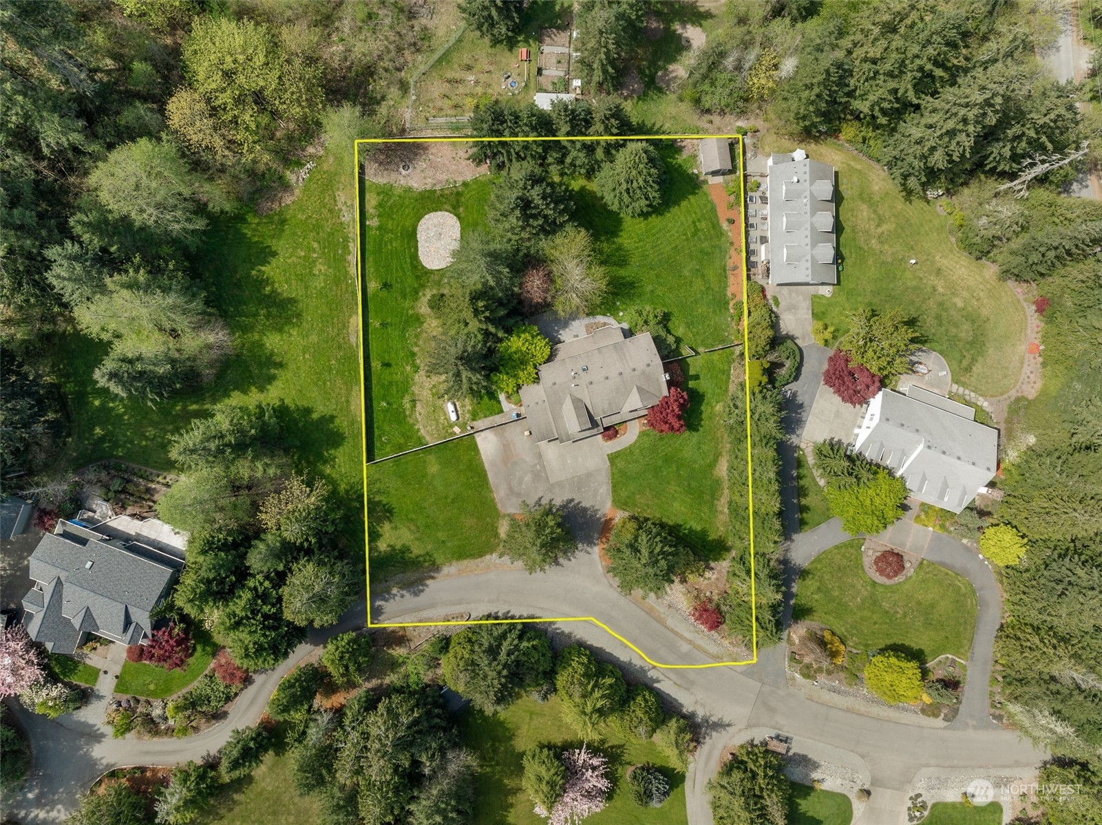 24827 247th Place Southeast Maple Valley, WA 98038 - Photo 32 of 33 an aerial view of a house with a yard