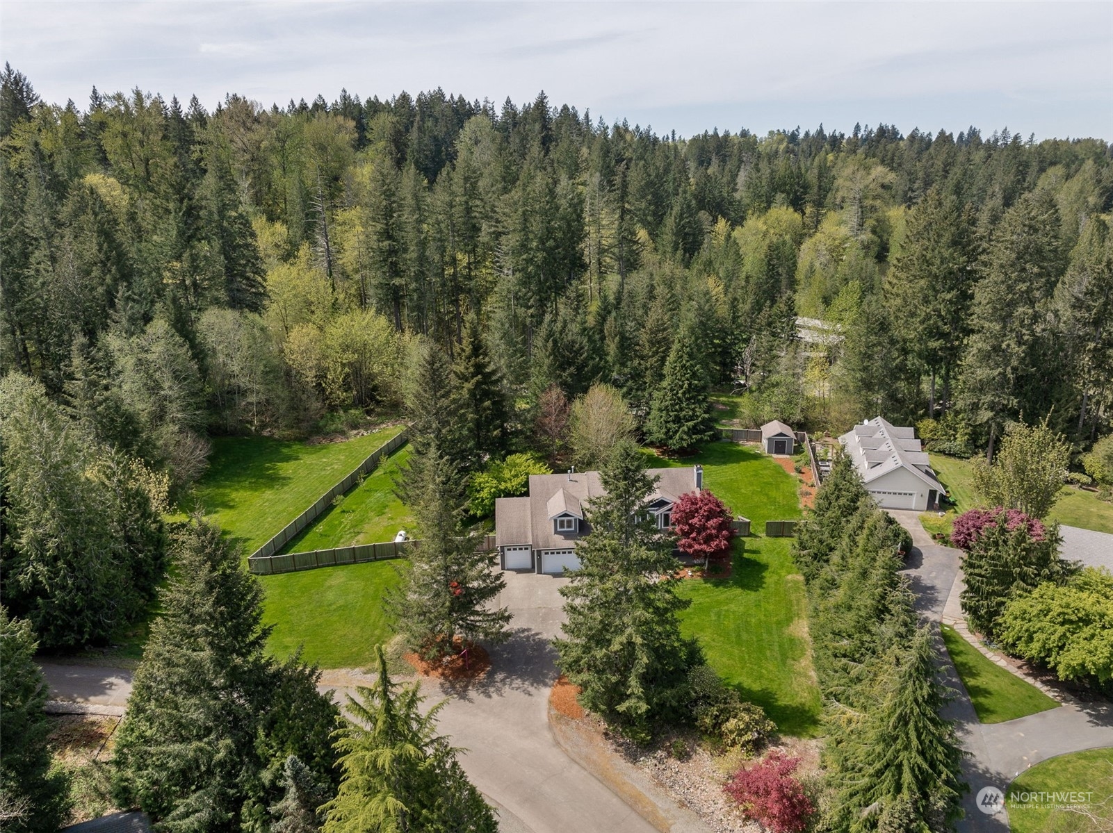 24827 247th Place Southeast Maple Valley, WA 98038 - Photo 33 of 33 an aerial view of a house with a yard