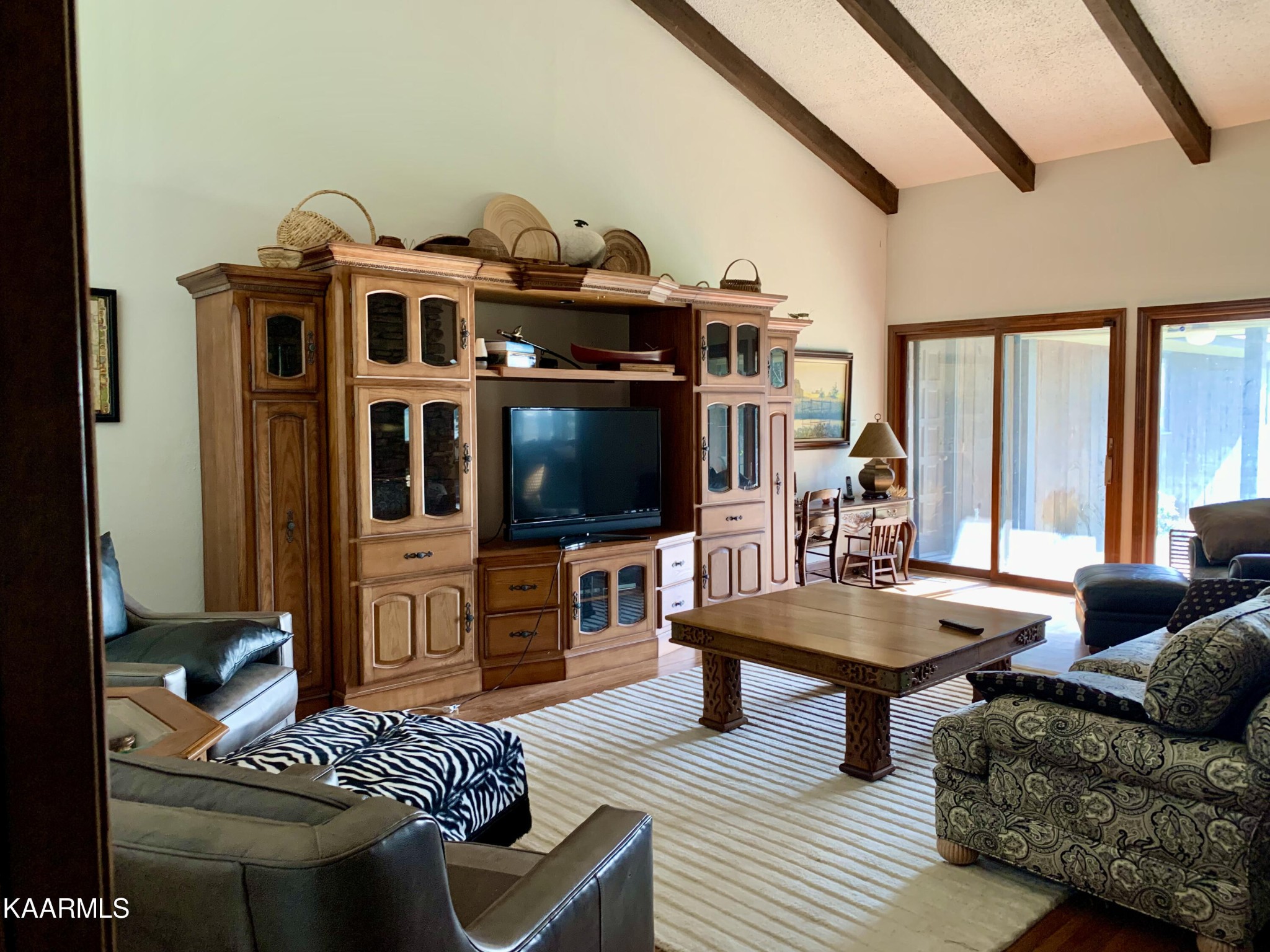 810 Whitaker Road New Market, TN 37820 - Photo 16 of 54 a living room with furniture and a flat screen tv