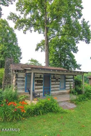 810 Whitaker Road New Market, TN 37820 - Photo 33 of 54 a backyard of a house with lots of green space