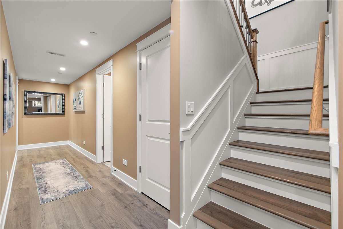 1330 Lacoma Drive Lockport, IL 60441 - Photo 22 of 36 a view of entryway with wooden floor and stairs