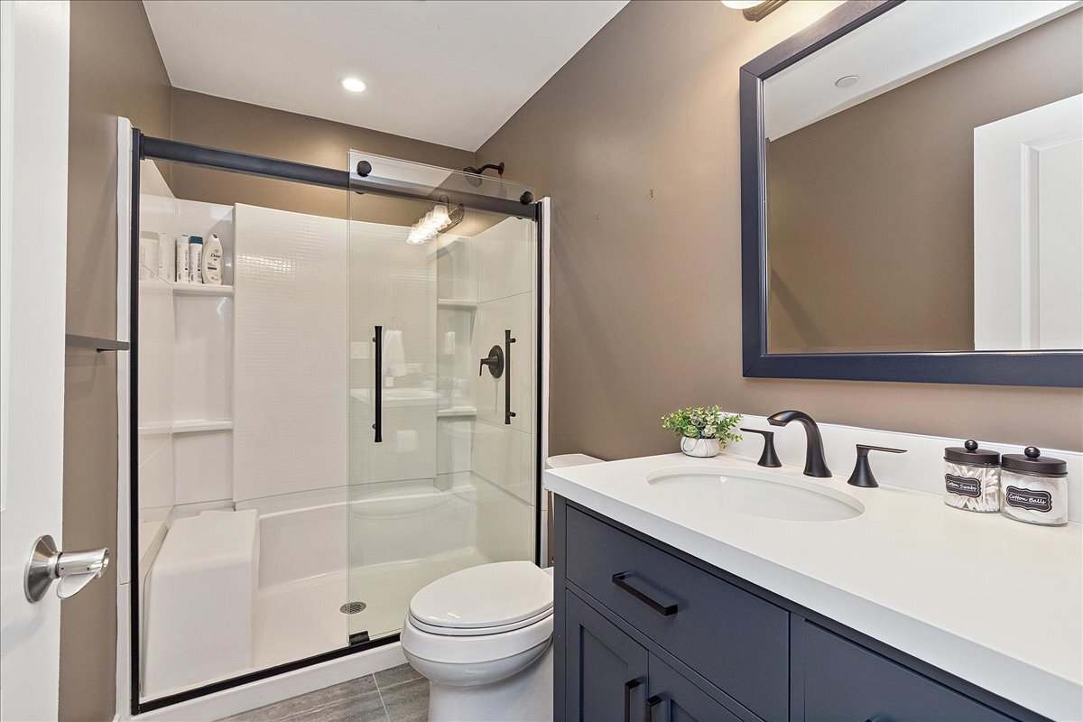 1330 Lacoma Drive Lockport, IL 60441 - Photo 28 of 36 a bathroom with a sink toilet and shower