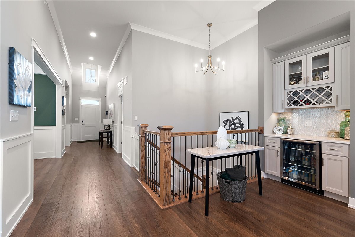 1330 Lacoma Drive Lockport, IL 60441 - Photo 4 of 36 a view of a livingroom with furniture wooden floor and a chandelier