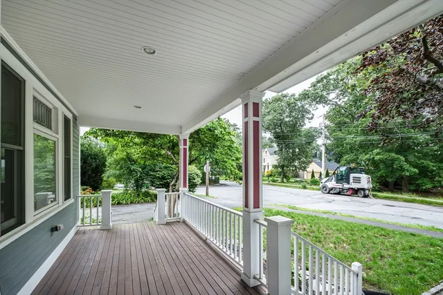 a view of outdoor space with deck and wooden floor