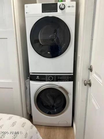 a table with a chair and a potted plant