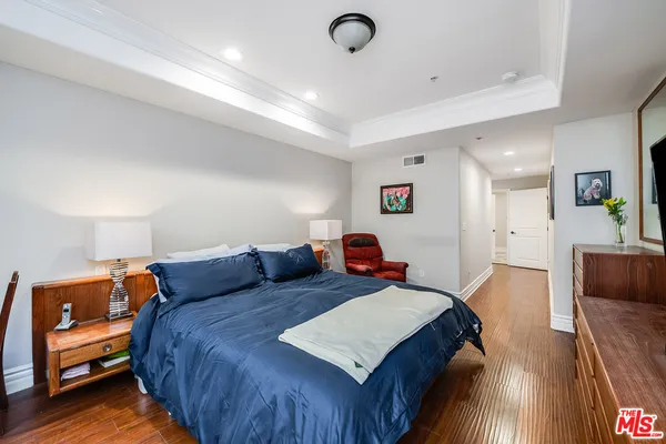 a bed room with a bed and a couch