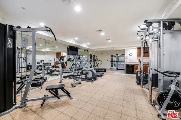 a view of a room with gym equipment