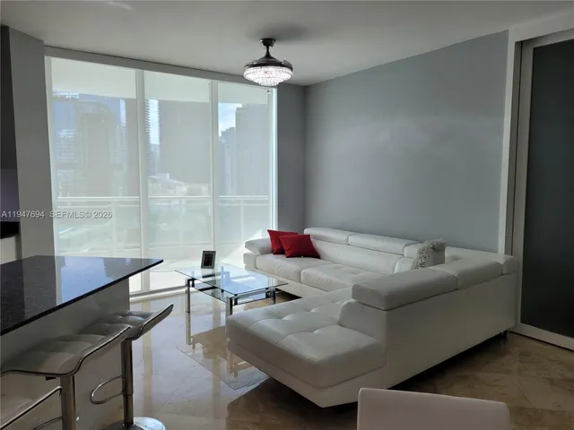 a view of a city with tall buildings