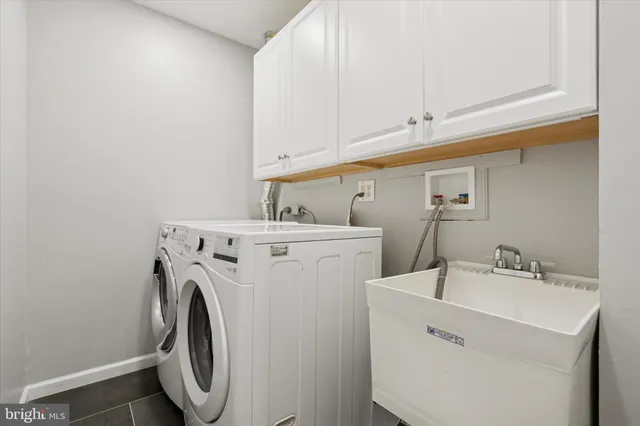 a bathroom with a sink toilet vanity and shower