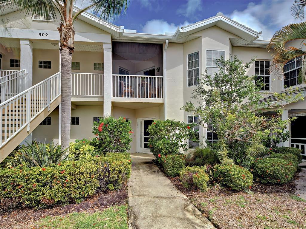 902 Addington Court, Unit 103 Venice, FL 34293 - Photo 2 of 48 front view of a house