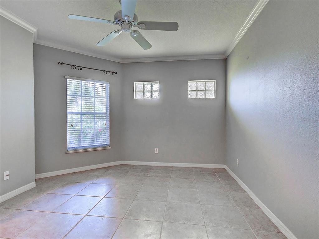 902 Addington Court, Unit 103 Venice, FL 34293 - Photo 28 of 48 a view of an empty room with a window