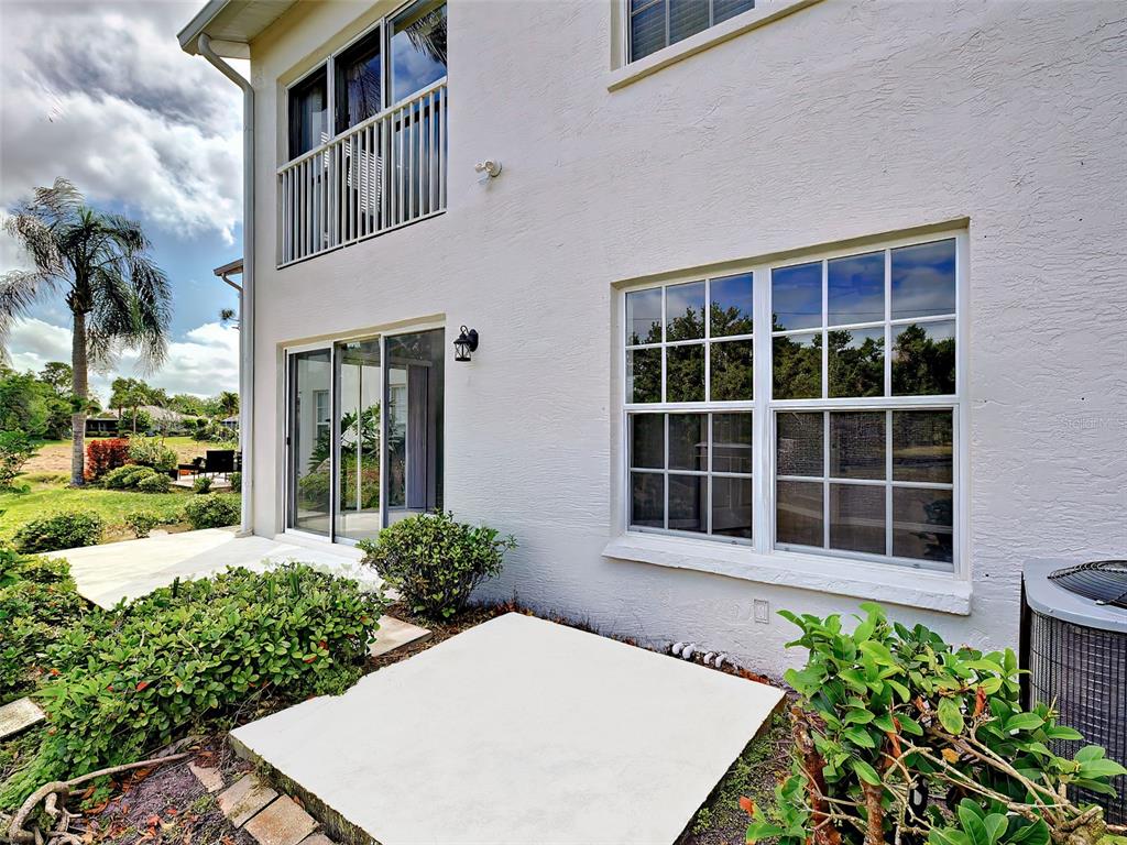 902 Addington Court, Unit 103 Venice, FL 34293 - Photo 36 of 48 front view of a house with a window