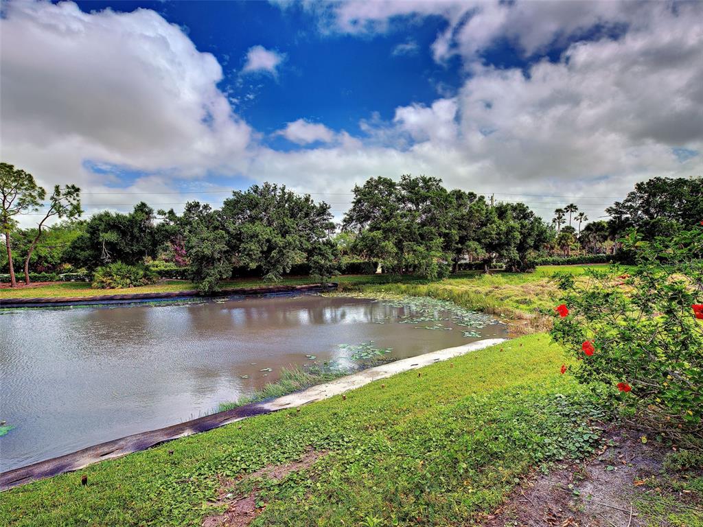 902 Addington Court, Unit 103 Venice, FL 34293 - Photo 38 of 48 a view of a lake