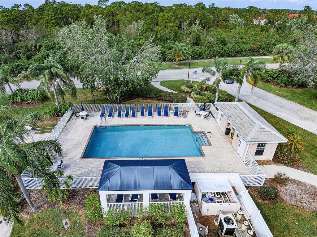 902 Addington Court, Unit 103 Venice, FL 34293 - Photo 41 of 48 an aerial view of a house with a yard