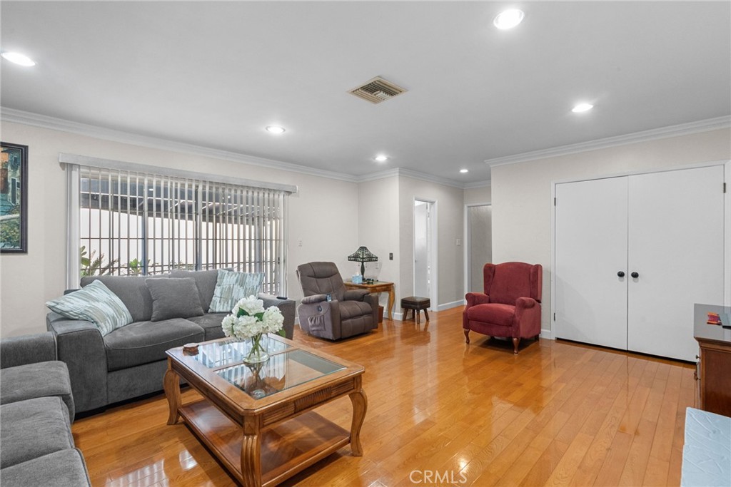 622 Griffith Street San Fernando, CA 91340 - Photo 21 of 35 a living room with furniture and a large window