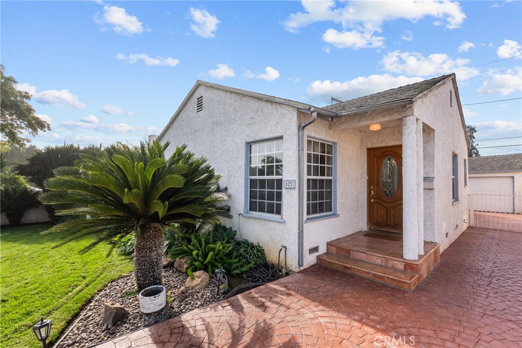 622 Griffith Street San Fernando, CA 91340 - Photo 3 of 35 a house with a garden space