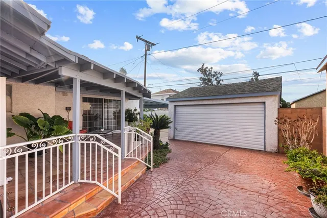 a view of a chair and table in the patio