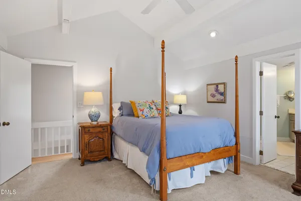 a bedroom with a bed and a cabinets