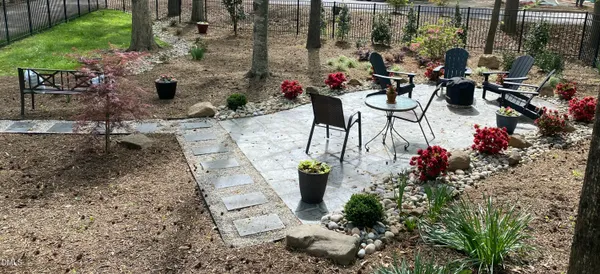 a view of swimming pool with sitting area