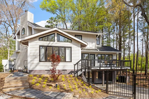 a front view of a house with swimming pool