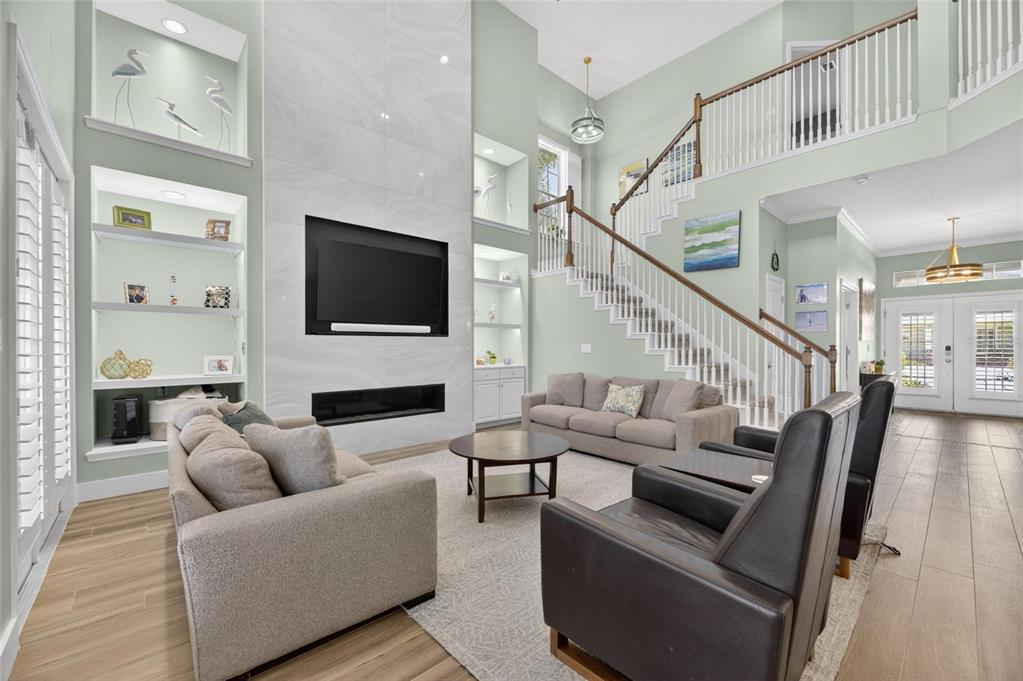 508 Islebay Drive Apollo Beach, FL 33572 - Photo 21 of 98 a living room with furniture and a flat screen tv