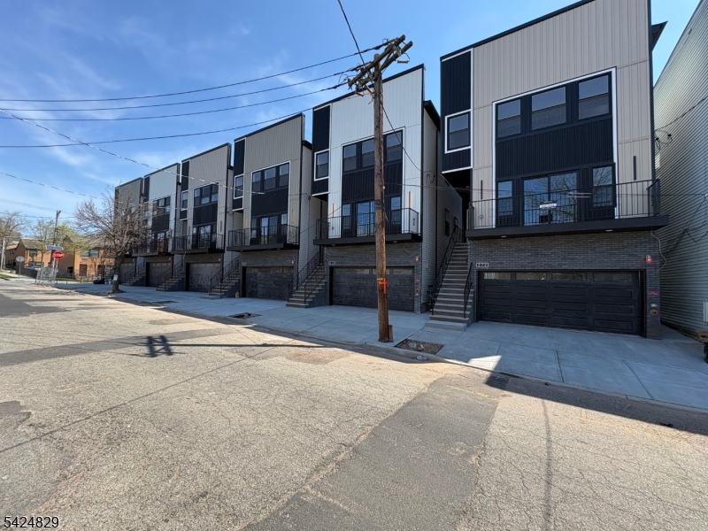 262 Hunterdon Street, Unit 1 Newark, NJ 07103 - Photo 30 of 31 a view of a building with a patio