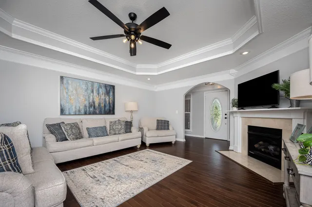 a view of walk in closet with clothes