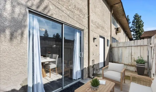 a view of a house with a snow in the yard