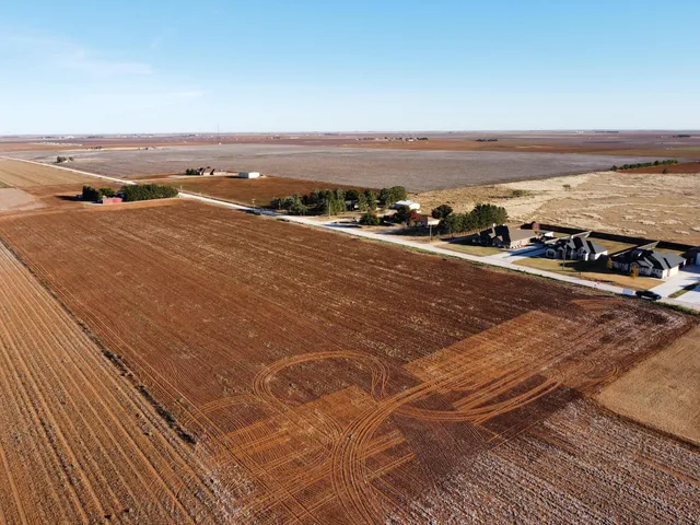 an aerial view of beach and ocean