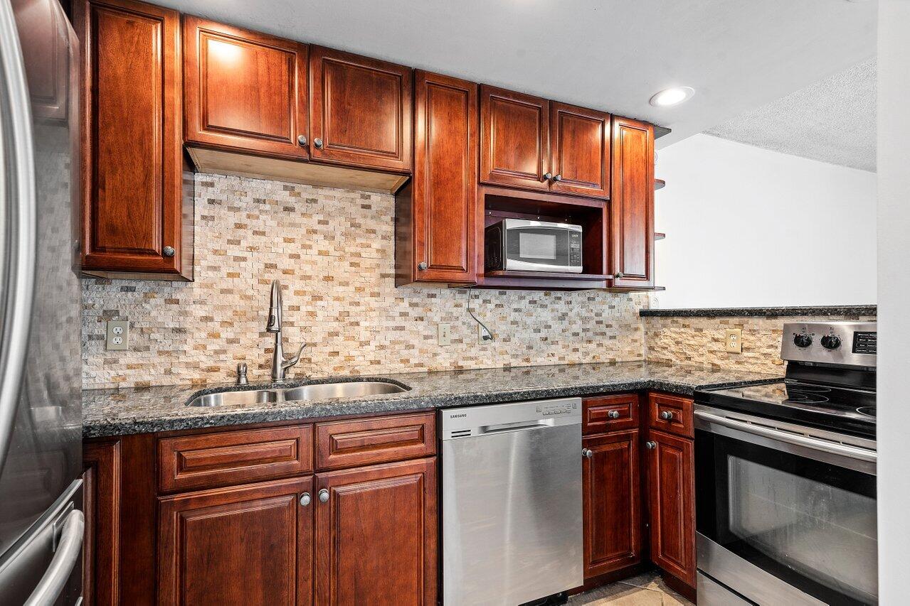 1100 Alton Road, Unit 2E Miami Beach, FL 33139 - Photo 1 of 15 013-1100AltonRoad-MiamiBeach-FL-33139-SM