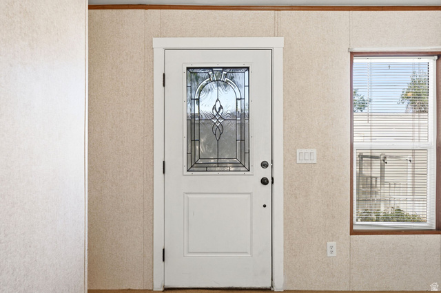 2875 North Hill Field Road, Unit 62 Layton, UT 84041 - Photo 8 of 34 Entry door with decorative leaded glass paneling