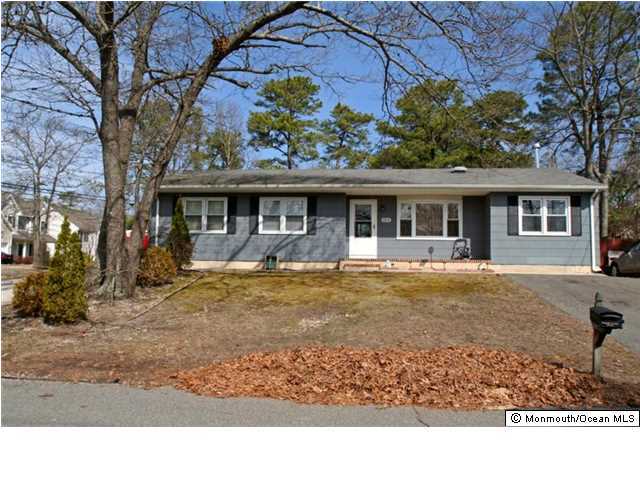 1906 Whitcomb Road Forked River, NJ 08731 - Photo 1 of 10 a front view of a house with garden