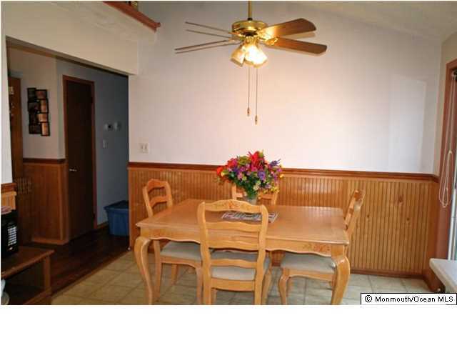 1906 Whitcomb Road Forked River, NJ 08731 - Photo 10 of 10 a kitchen with a table and chairs