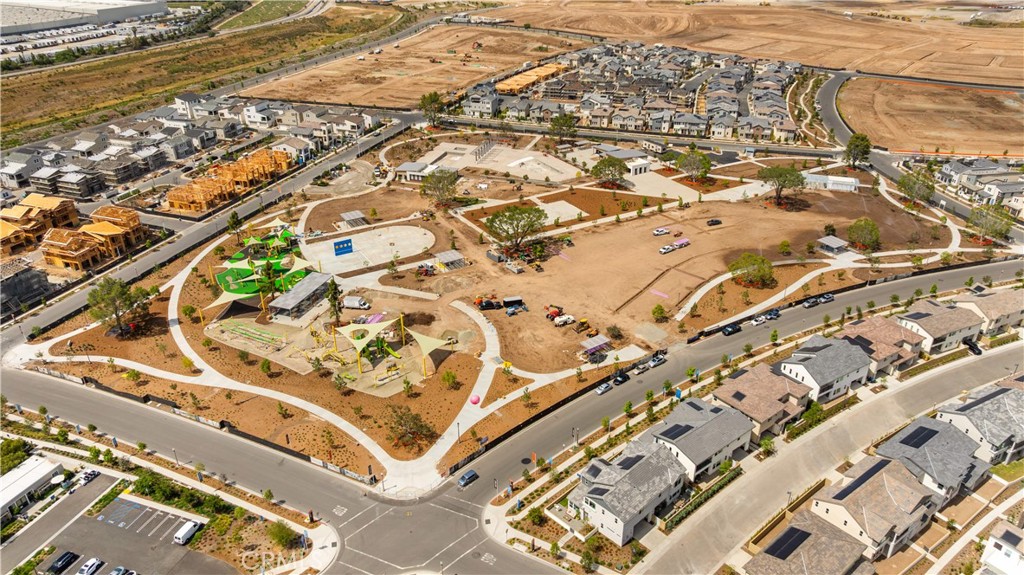 209 Mask Irvine, CA 92618 - Photo 39 of 40 an aerial view of residential building with parking space