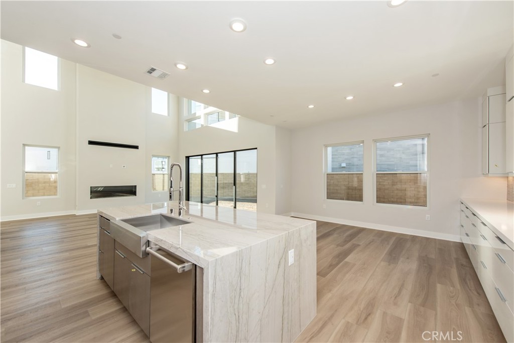 209 Mask Irvine, CA 92618 - Photo 7 of 40 a large kitchen with granite countertop a large counter top and sink