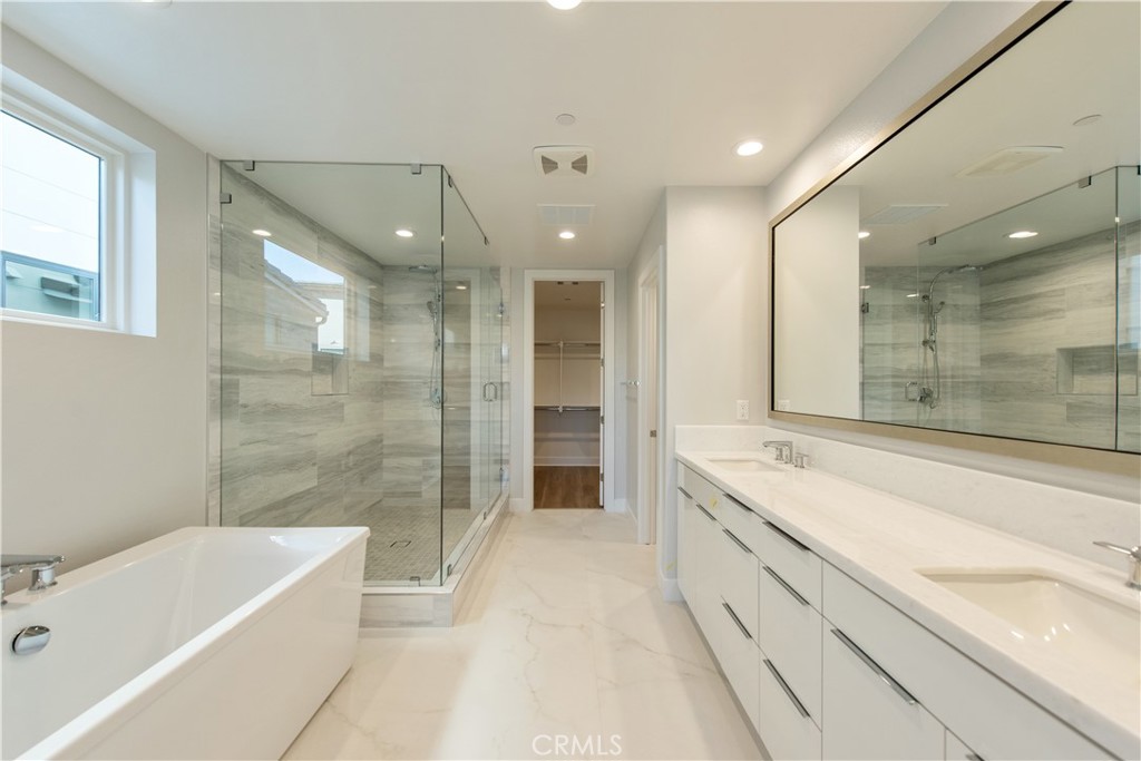 209 Mask Irvine, CA 92618 - Photo 10 of 40 a bathroom with a bathtub shower and sink