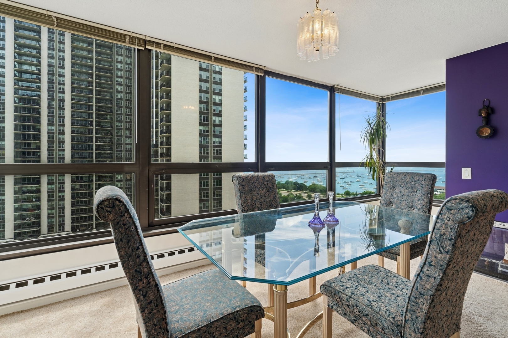 360 East Randolph Street, Unit 1208 Chicago, IL 60601 - Photo 11 of 27 a view of a dining room with furniture window and outside view