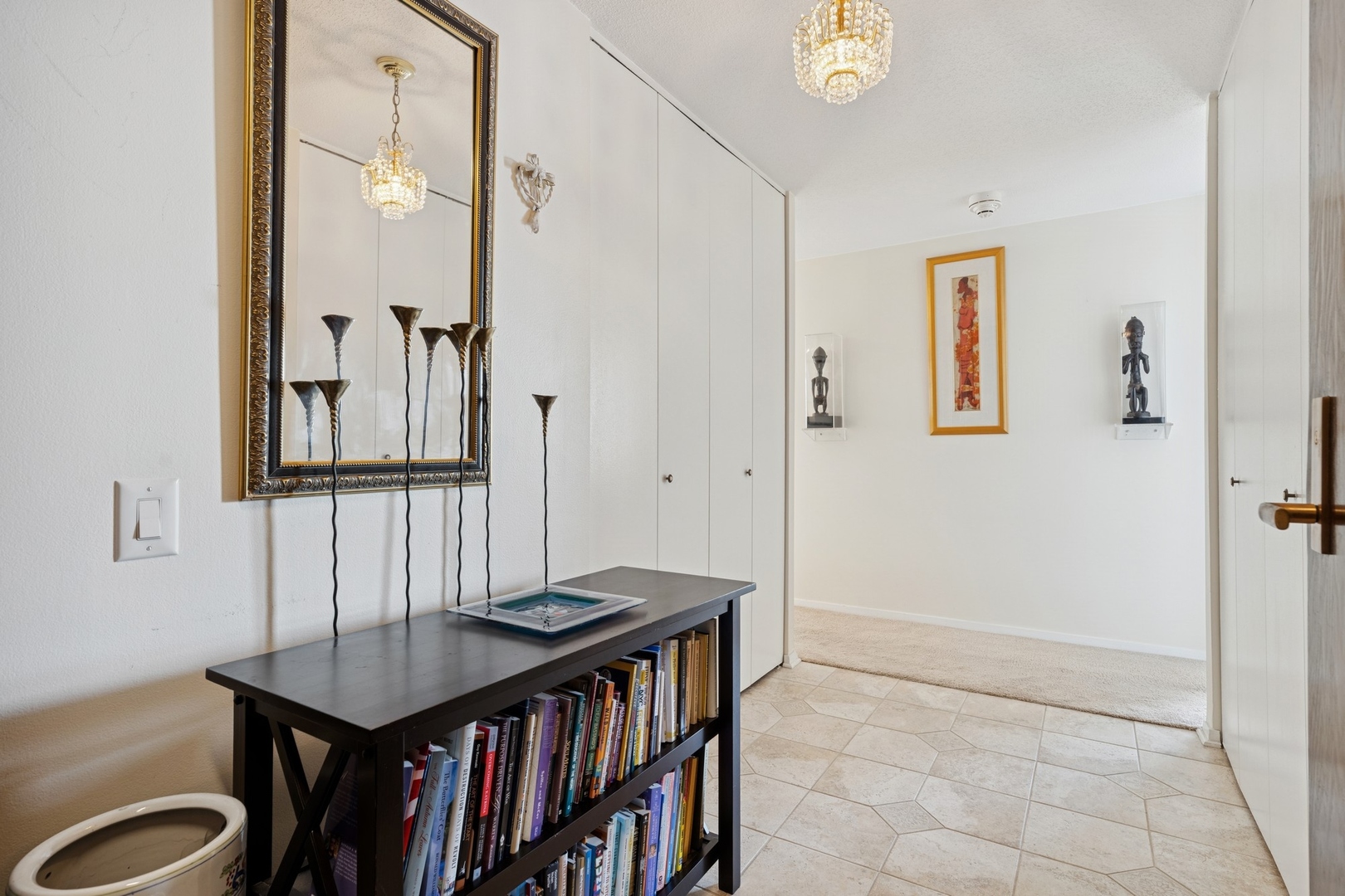 360 East Randolph Street, Unit 1208 Chicago, IL 60601 - Photo 2 of 27 a view of a hallway with furniture