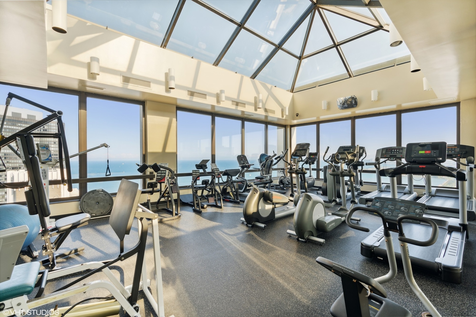 360 East Randolph Street, Unit 1208 Chicago, IL 60601 - Photo 22 of 27 a view of a room with gym equipment