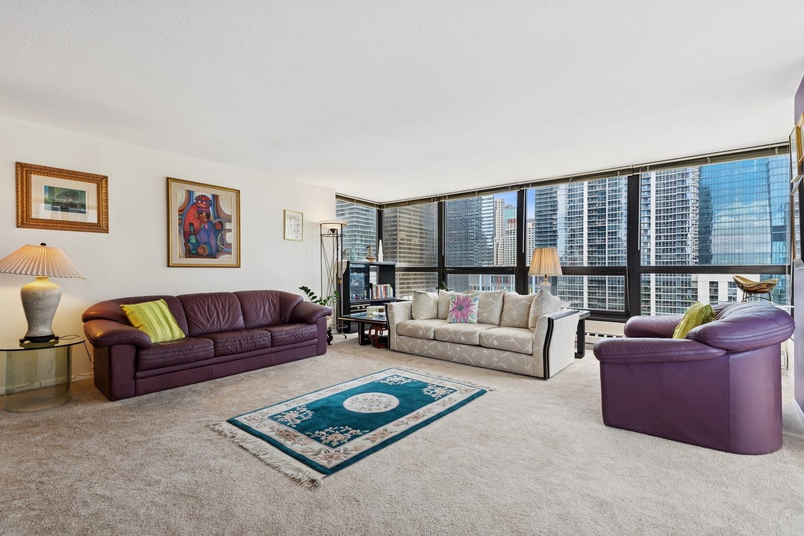 360 East Randolph Street, Unit 1208 Chicago, IL 60601 - Photo 5 of 27 a living room with furniture and a large window