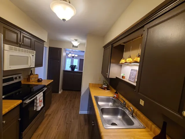 a room with furniture and flat screen tv