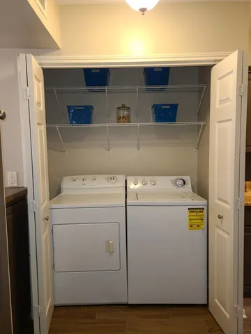 a view of staircase with white walls