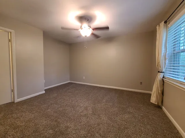 a bathroom with a double vanity sink and mirror