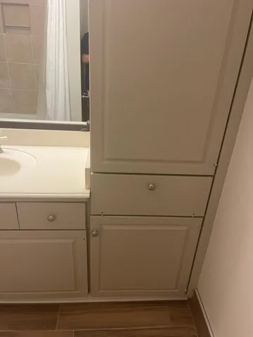 an empty room with a empty space and windows