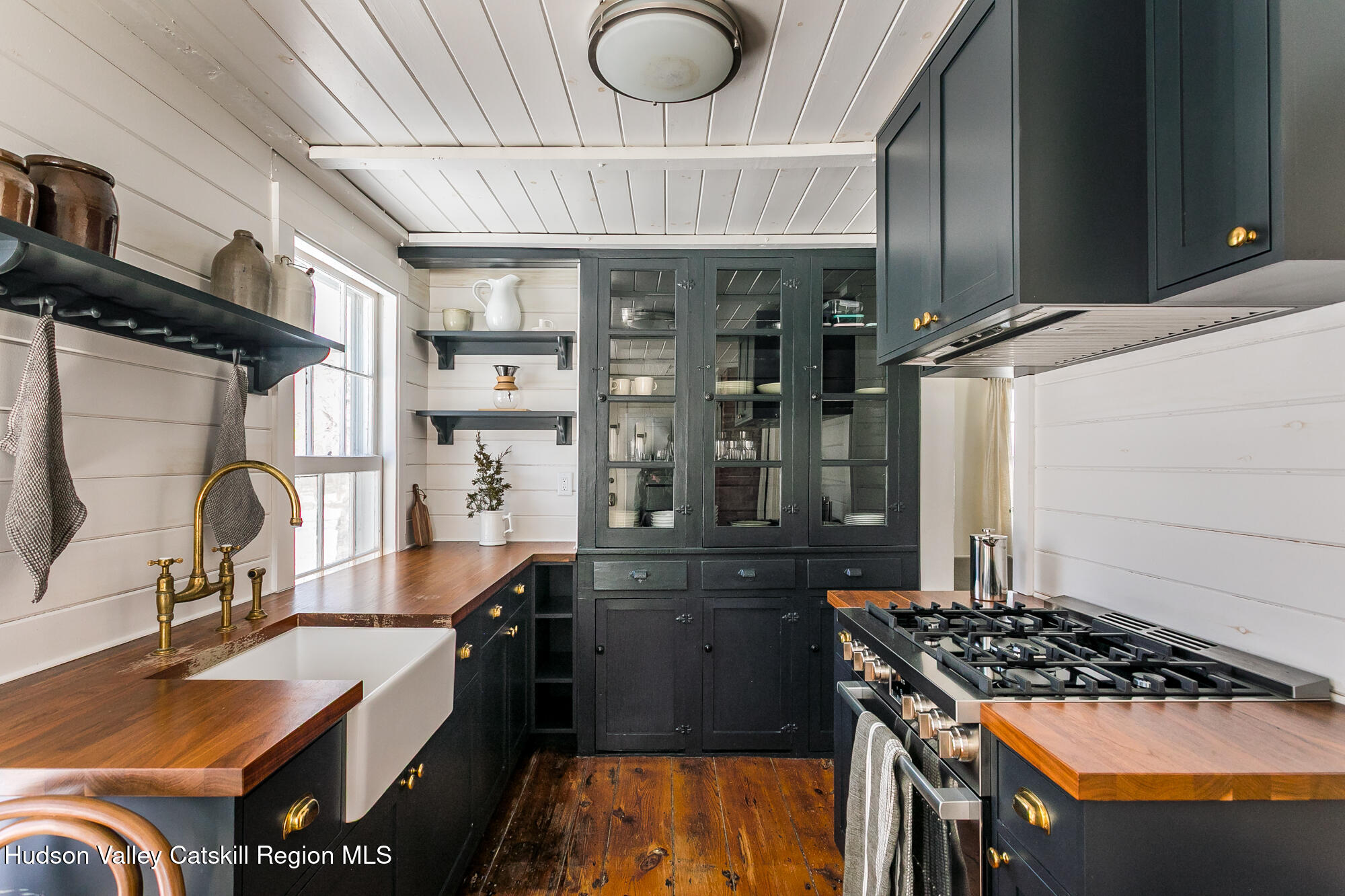 8 George Sickle Road Saugerties, NY 12477 - Photo 11 of 26 a kitchen with a sink stove and cabinets