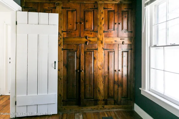 a view of walk in closet with large window