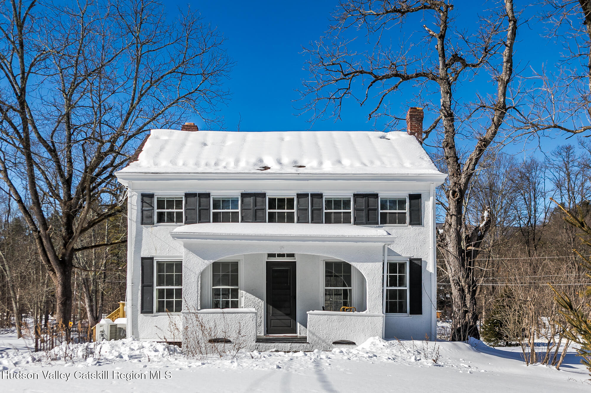8 George Sickle Road Saugerties, NY 12477 - Photo 2 of 26 a front view of a building with a garden